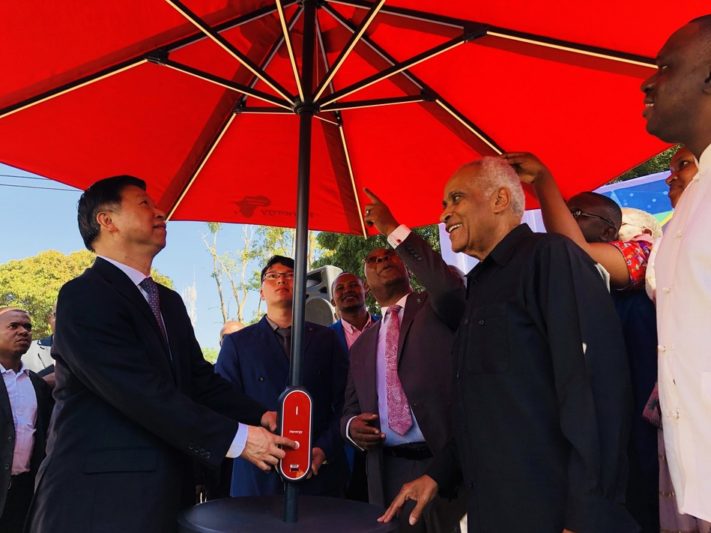 Minister Song Tao and Dr. Salim. Salim lit up the solar umbrella from Hanergy (PRNewsfoto/Hanergy Holding Group Ltd.)
