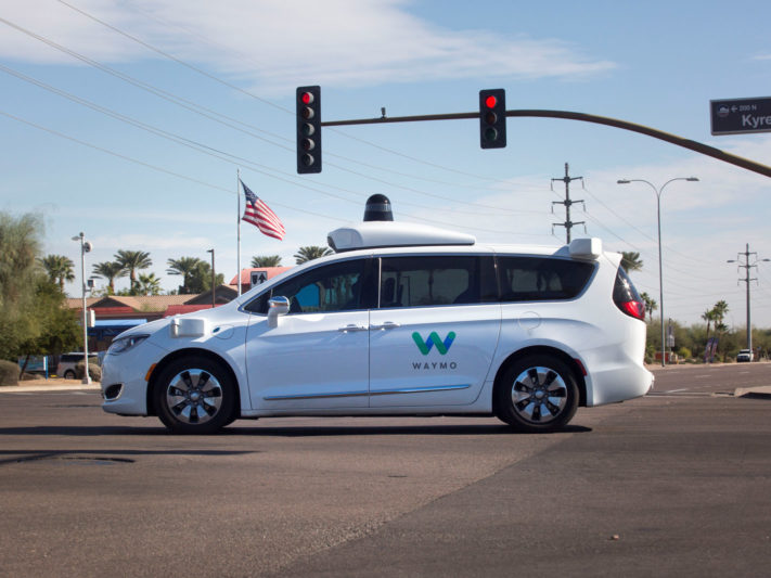A Waymo self-driving vehicle moves through an intersection in Chandler Arizona, U.S., December 2, 2017.  Photo taken on December 2, 2017.  REUTERS/Natalie Behring
