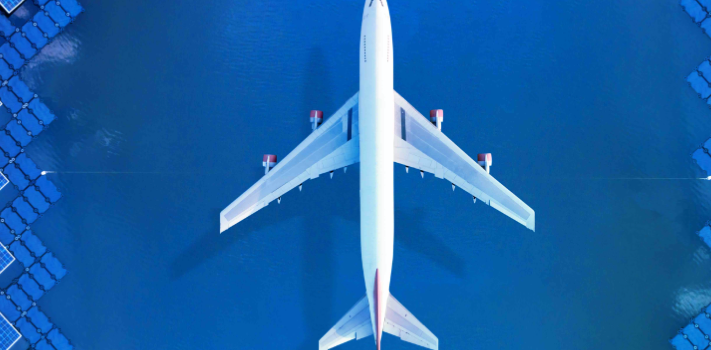 plane-in-solar-module-field-shutterstock-large-944x350